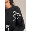 image:imageATHMILE Fall Sweaters for Women 2026 Fashion Cute Bow Knit Pullover Trendy Long Sleeve Oversized Sweater Winter ClothingBlack