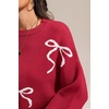 image:imageATHMILE Fall Sweaters for Women 2026 Fashion Cute Bow Knit Pullover Trendy Long Sleeve Oversized Sweater Winter ClothingRed